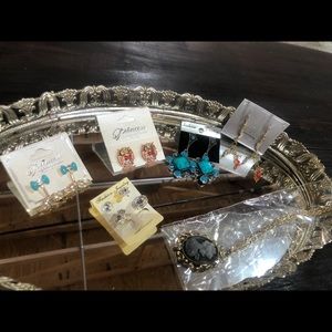 5 Costume earrings and a necklace